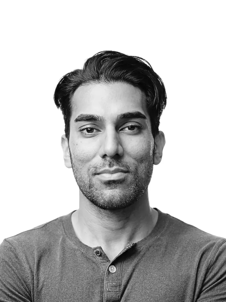 Black and white photograph of Joey Xoto, vandalised by the bots with coral felt-tip doodles